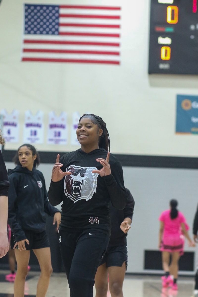 Laila Abdurraqib, Senior, poses for the camera during warmups.