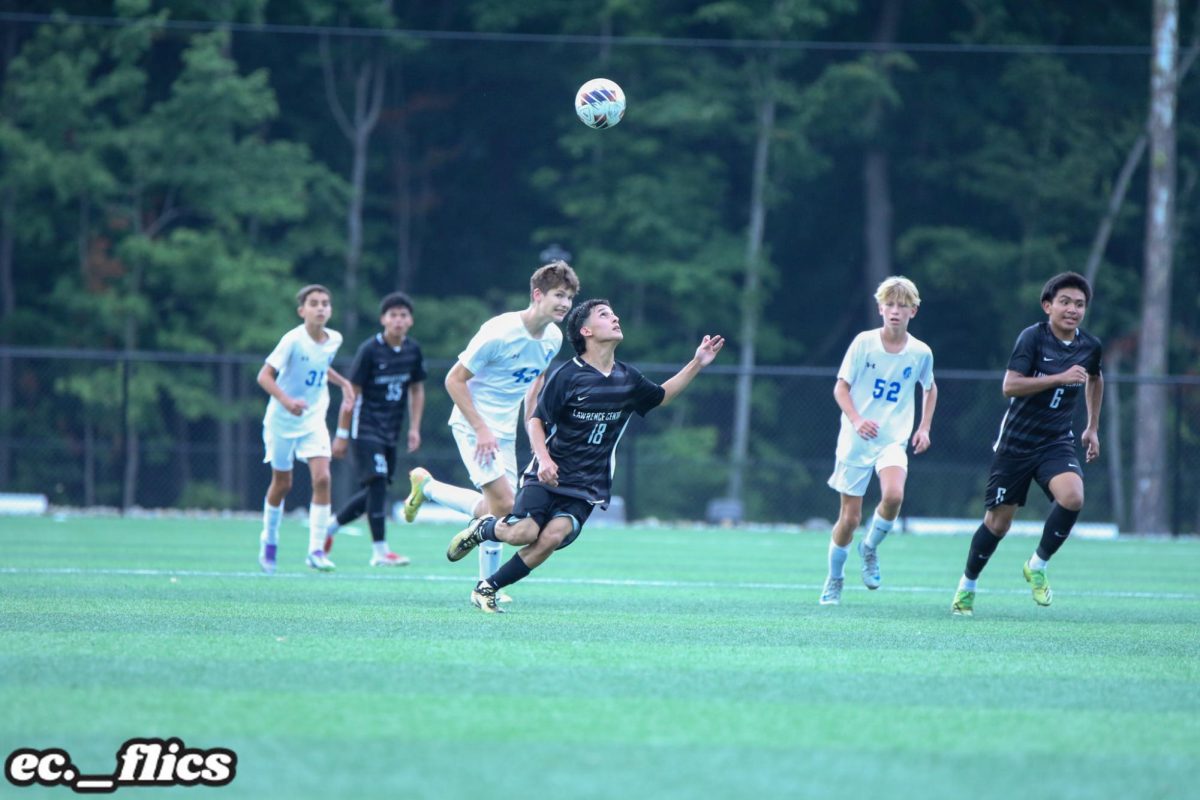 Didier Castellanos, senior, tries to find the ball after it was kicked by the goalie during the JV match vs Bishop Chatard.