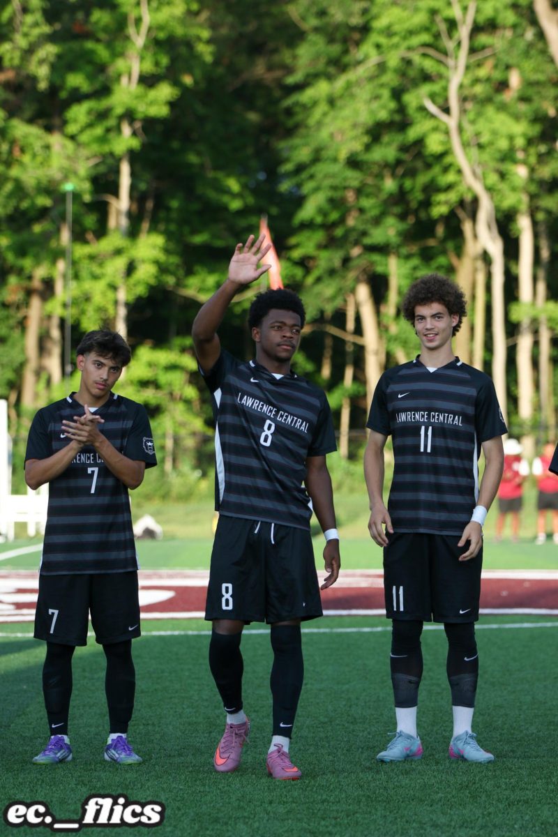 Solomon Rashid, Junior, waves to the fans while being introduced before the match vs Bishop Chatard.