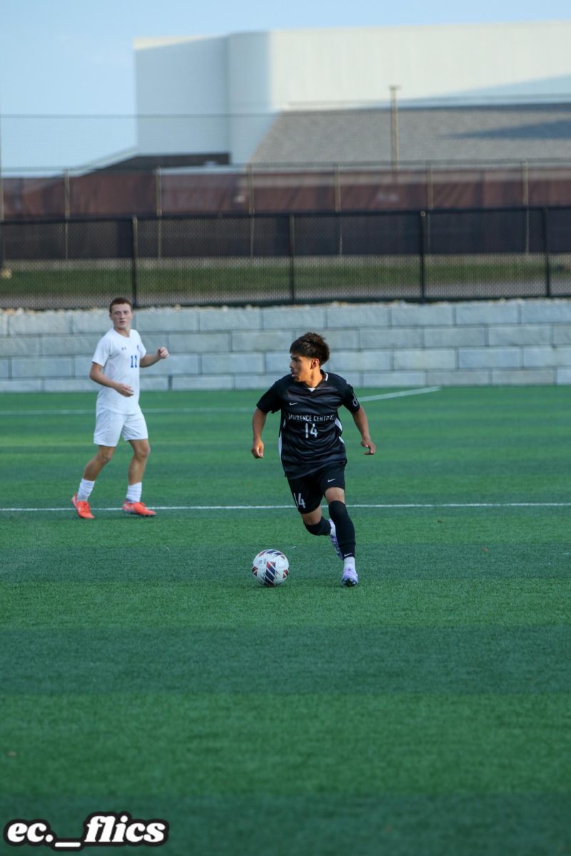 Christian Facundo, Senior, dribbles the ball upfield during the 1st half vs Bishop Chatard.