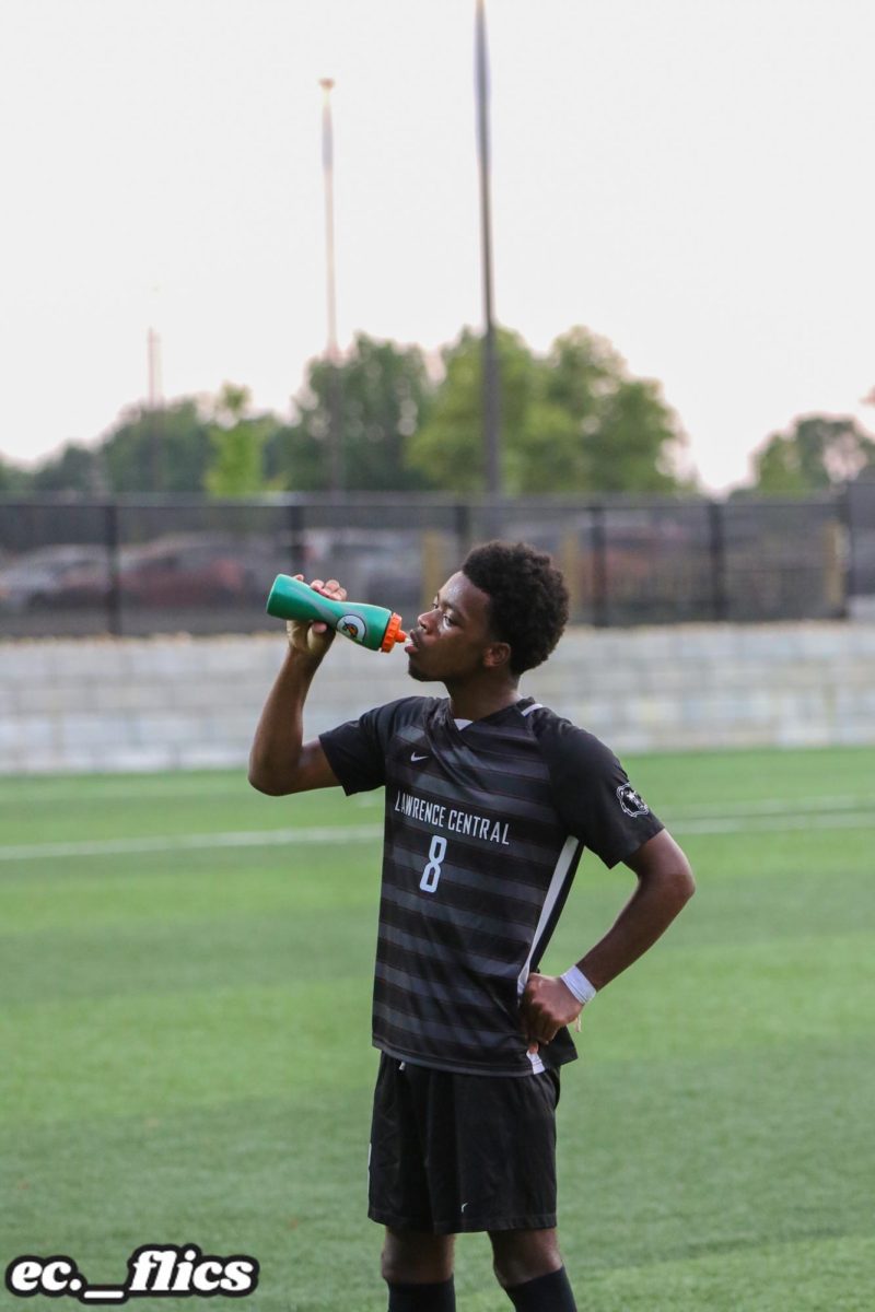 Solomon Rashid, Junior, gets a drink of water during halftime vs Bishop Chatard.