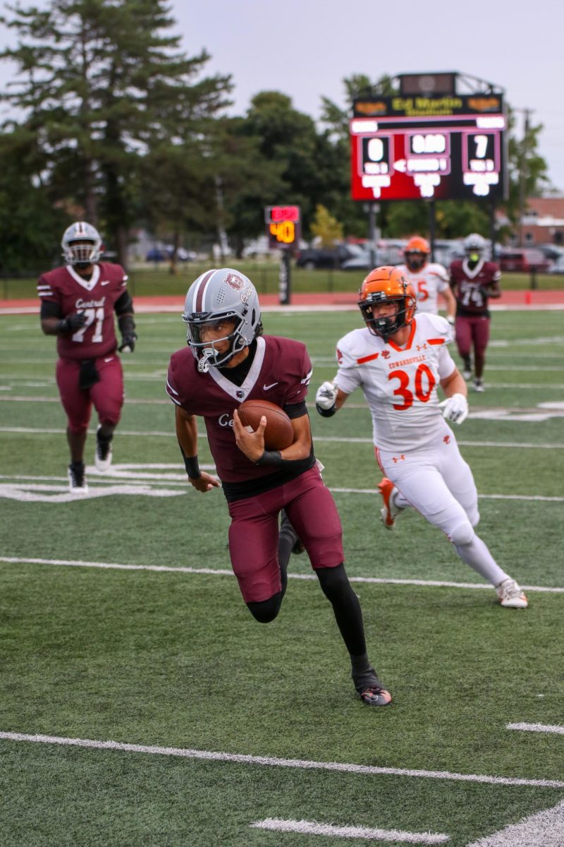 Santana Allen, Senior, rushes down the field after scrambling in the win vs Edwardsville, 61-21.