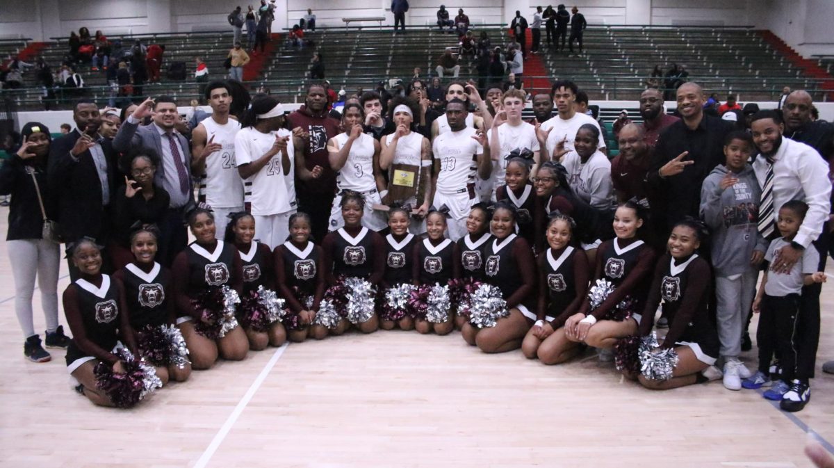The Lawrence Central Boys Basketball team poses with the IHSAA Sectional 10 Trophy